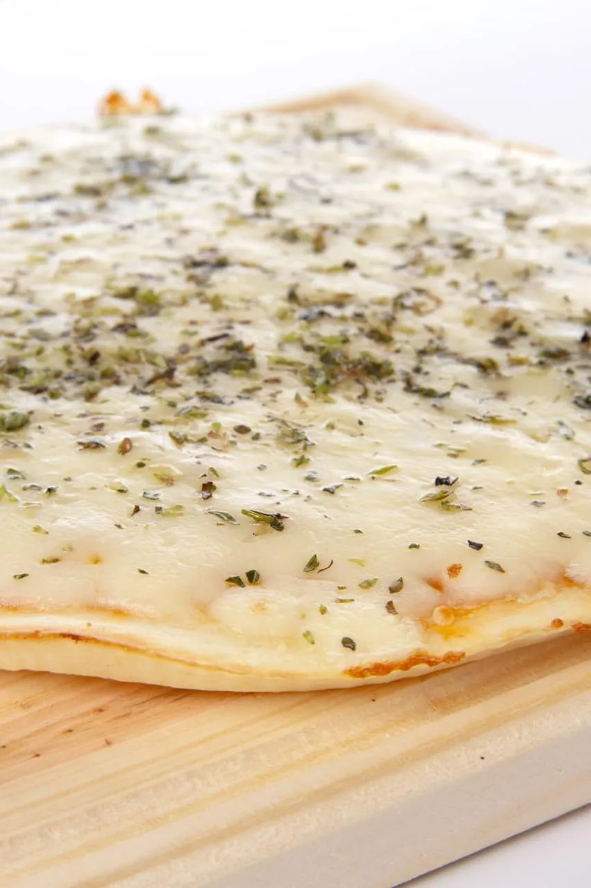 S- Pizza a la piedra Muzzarella o Fugazzeta
